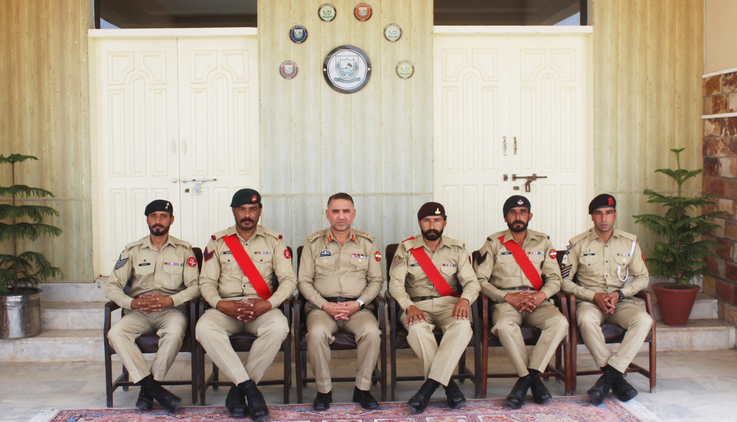 Commandant Brigadier Ameer Hassan with NCOs
